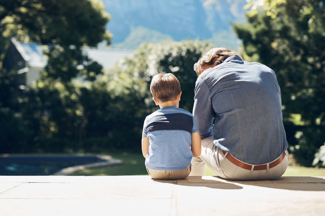 Father consoling son