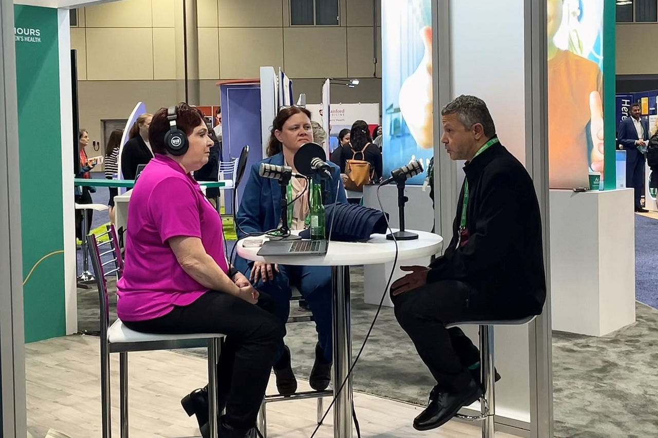 Nemours associates having a discussion at PAS on a podcast.