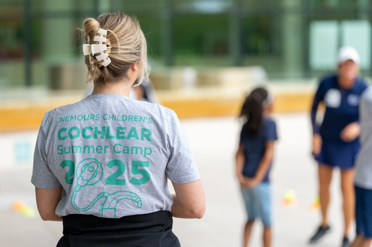 Teenage girl at cochlear implant summer camp.
