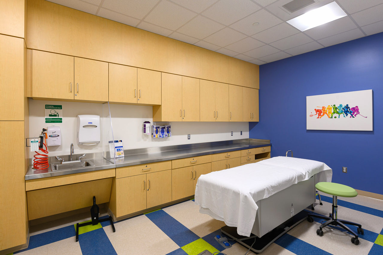 Teen with physical therapist