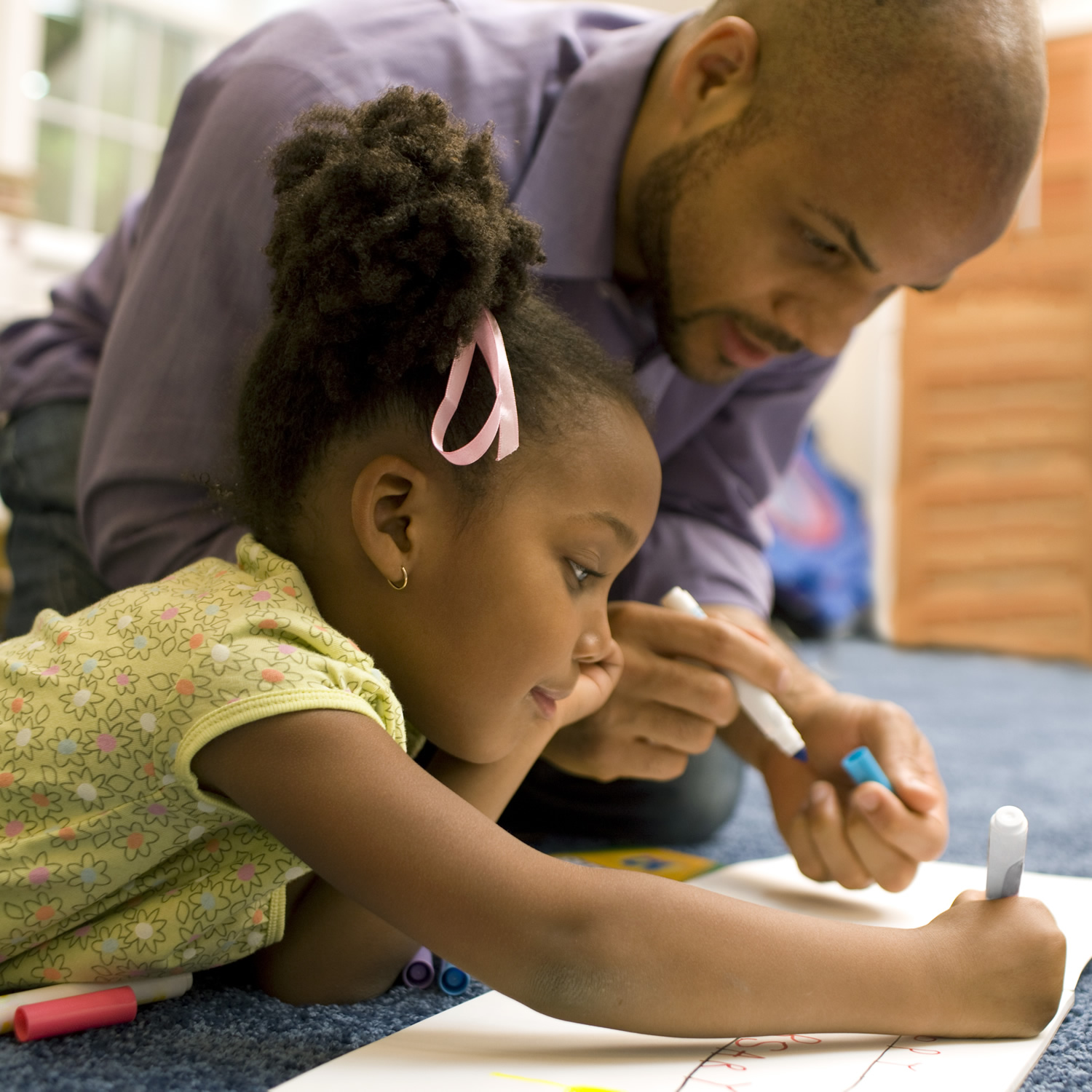 Games and activities to teach beginning writing skills to two-year-olds.