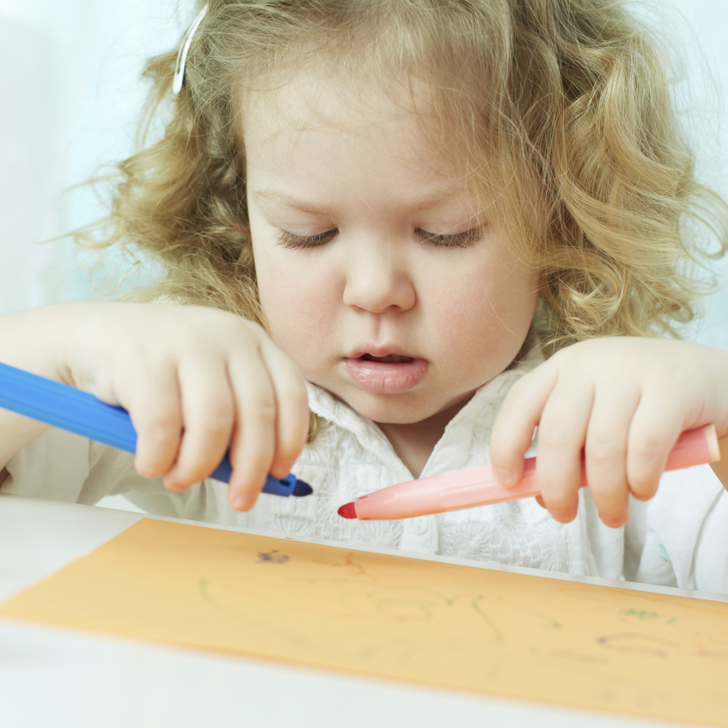 Games and activities to teach beginning writing skills to two-year-olds.
